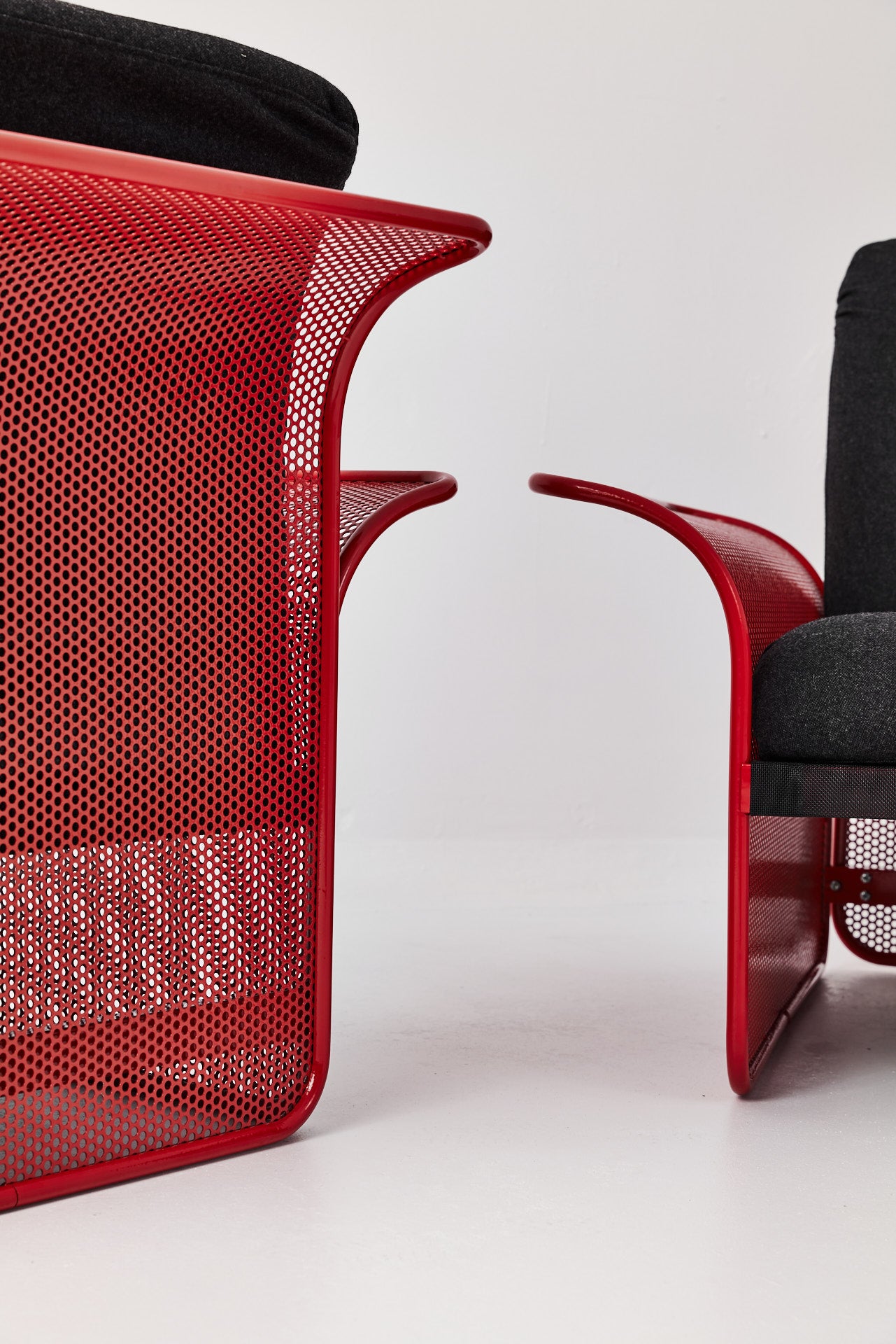 Restored Red perforated steel lounge chair - One available